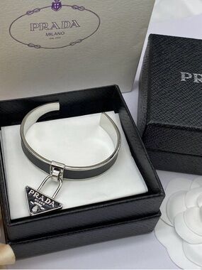Prada Silver-Tone Cuff Bracelet with Black Leather Inlay and Logo Charm